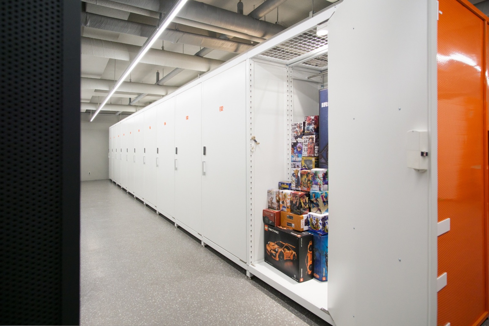 A self-storage corridor in Korea showing the gap between the floor and the base of each unit